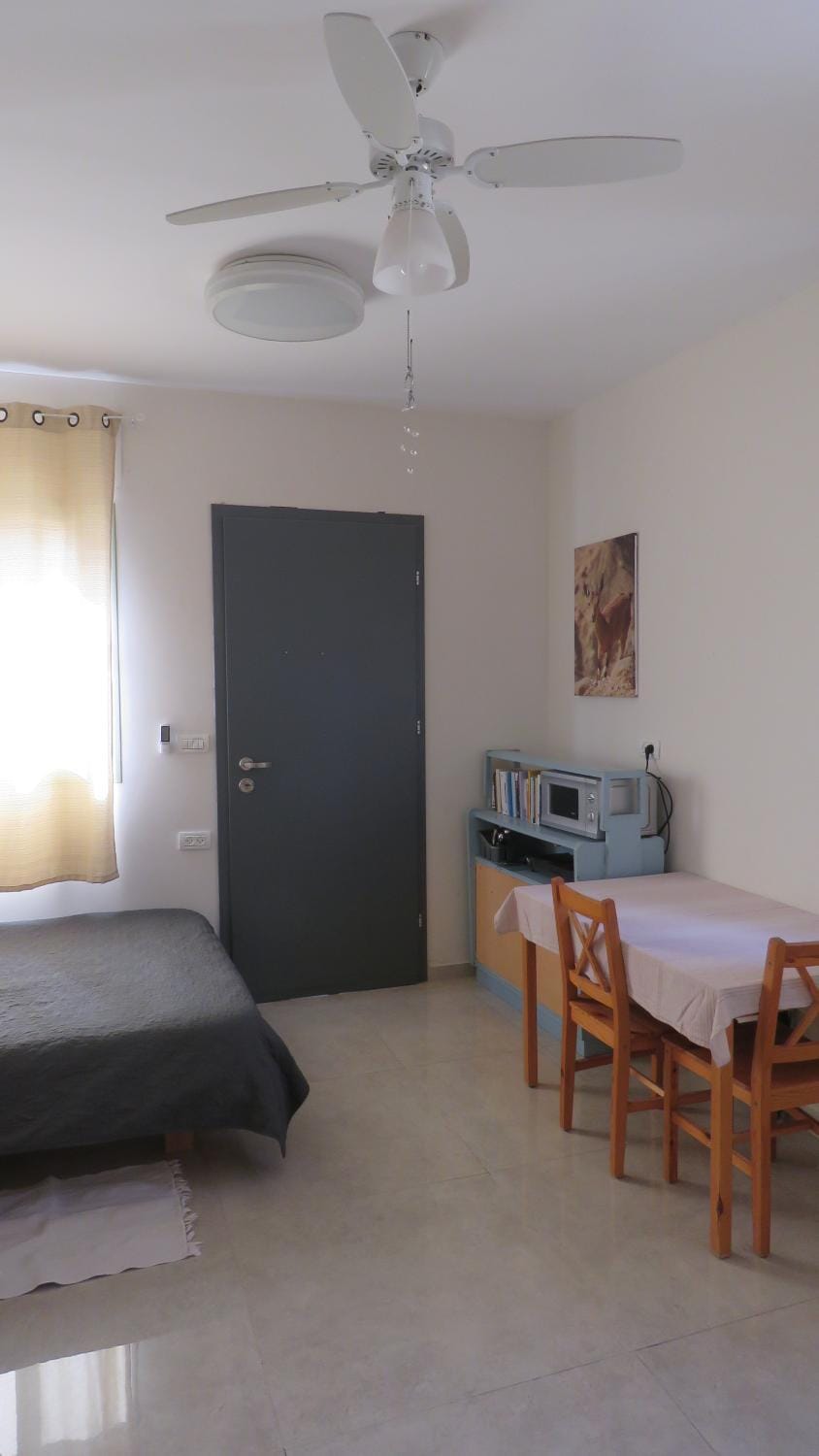 Photo of the whole room, Seating area, Dining area, microwave, air conditioner