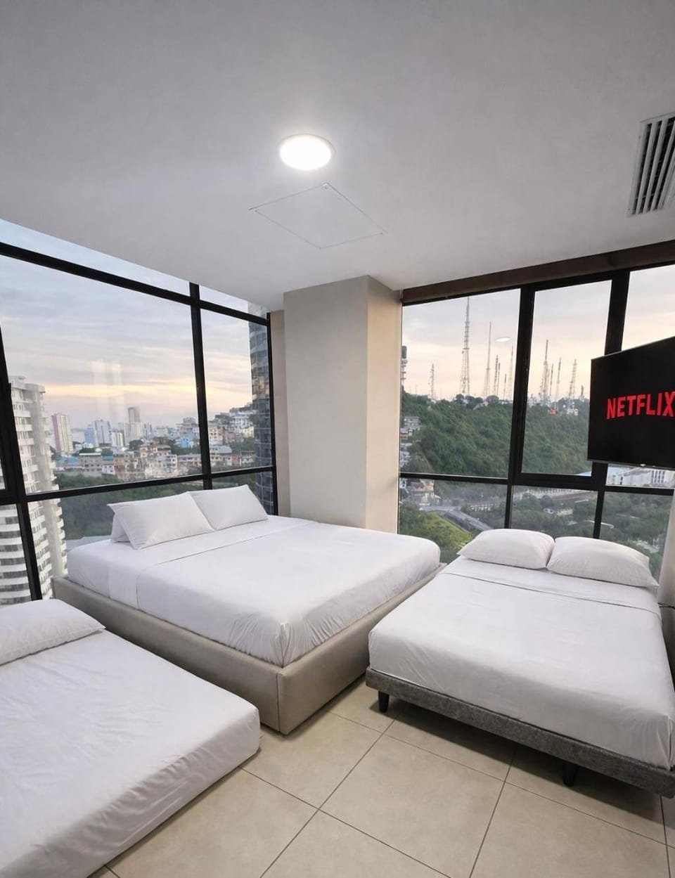Communal lounge/ TV room, Bed, Bird's eye view, TV and multimedia, air conditioner
