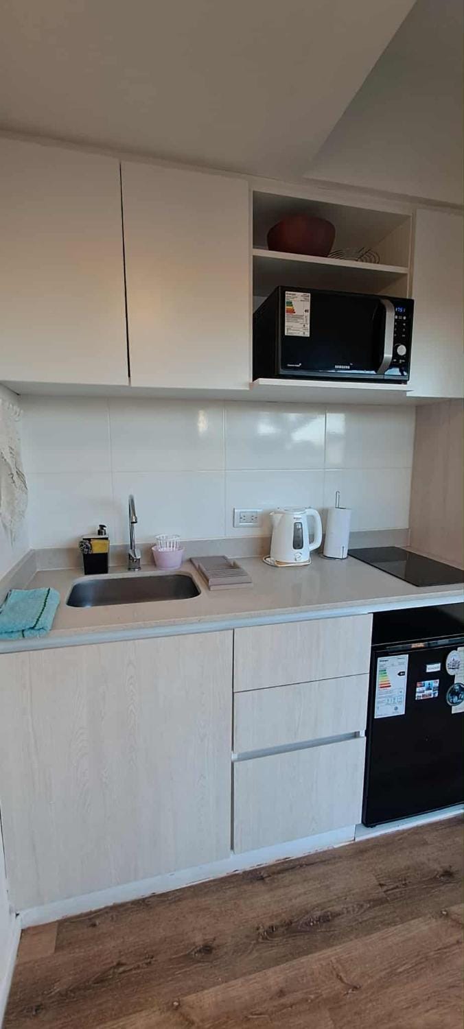 Kitchen or kitchenette, stove