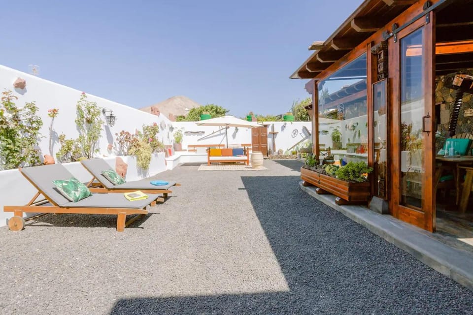 Property building, Patio, Spring, Day, Natural landscape, Mountain view, sunbed