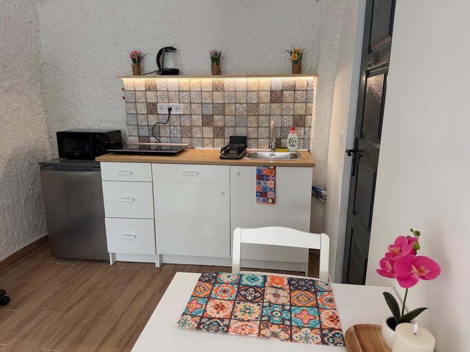 Kitchen or kitchenette, microwave