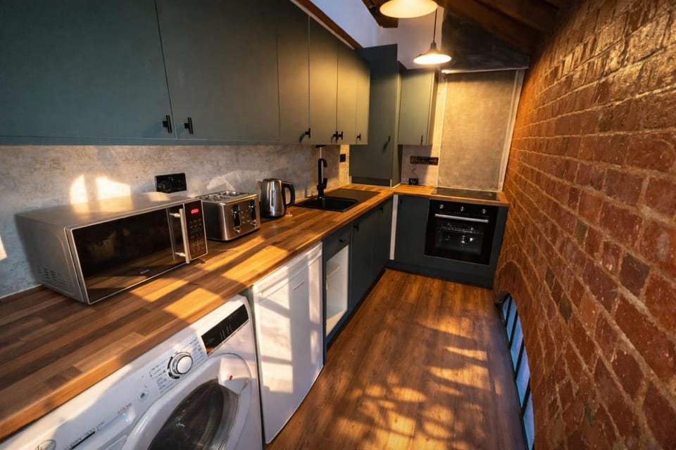 microwave, oven, stove, toaster, washing machine, kitchen