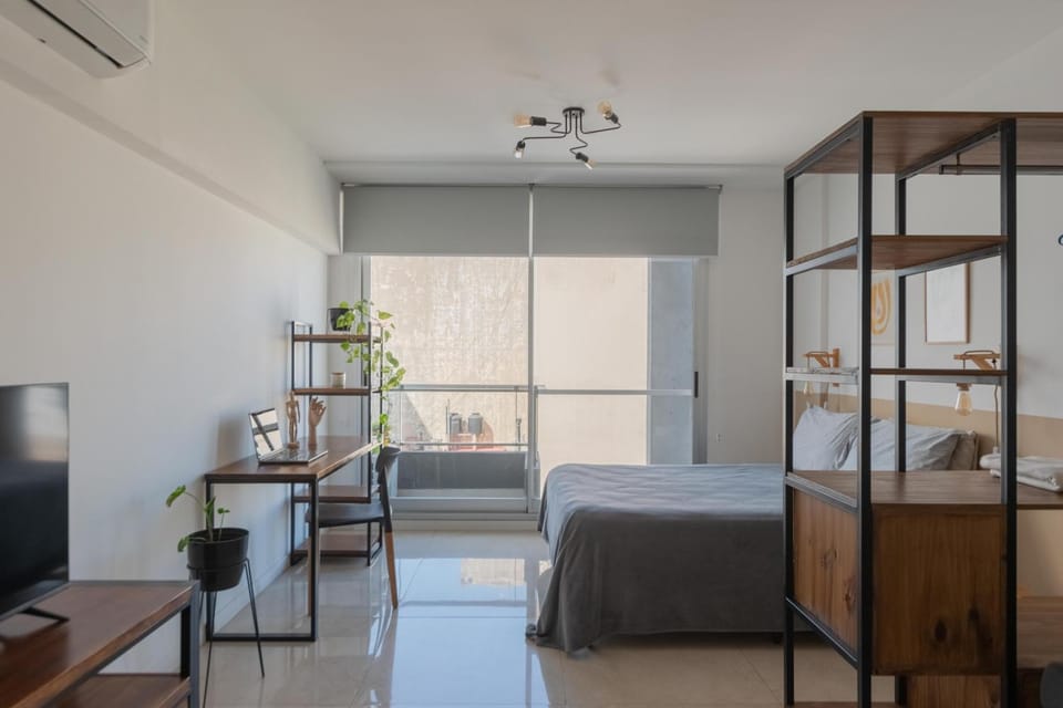 Bed, TV and multimedia, Living room, Photo of the whole room, Seating area, Bedroom, air conditioner