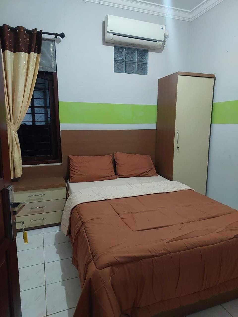 Bed, wardrobe, air conditioner