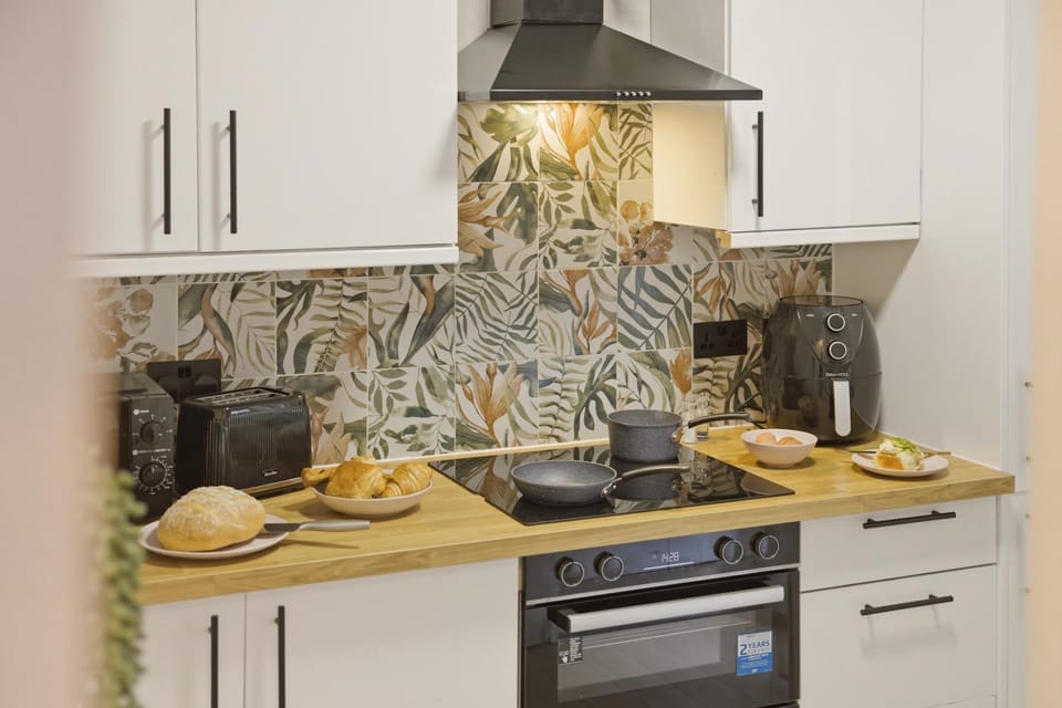 Kitchen or kitchenette, stove, toaster