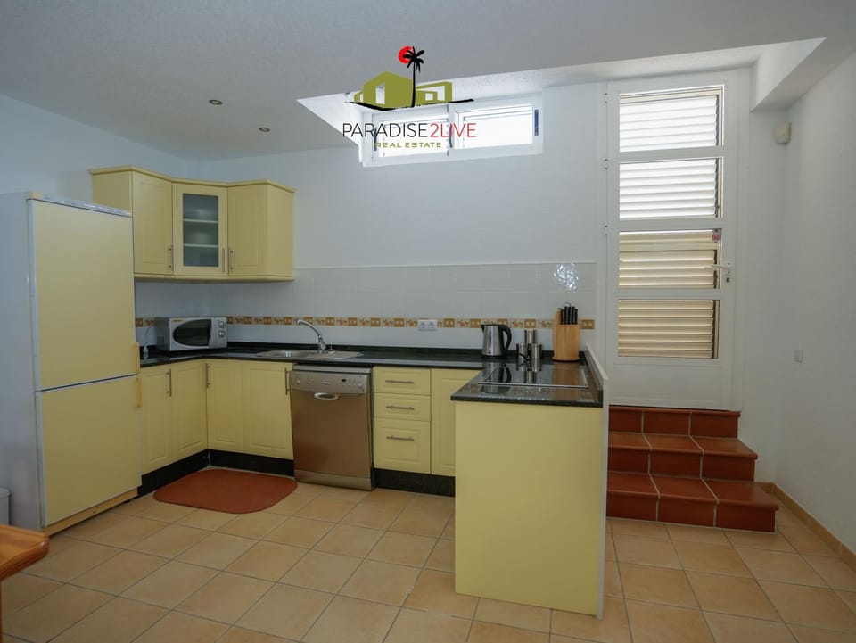 Kitchen or kitchenette, dishwasher, microwave, stove