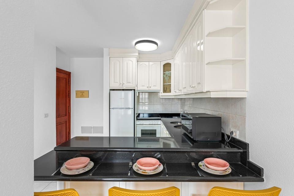 Dining area, microwave, oven, kitchen