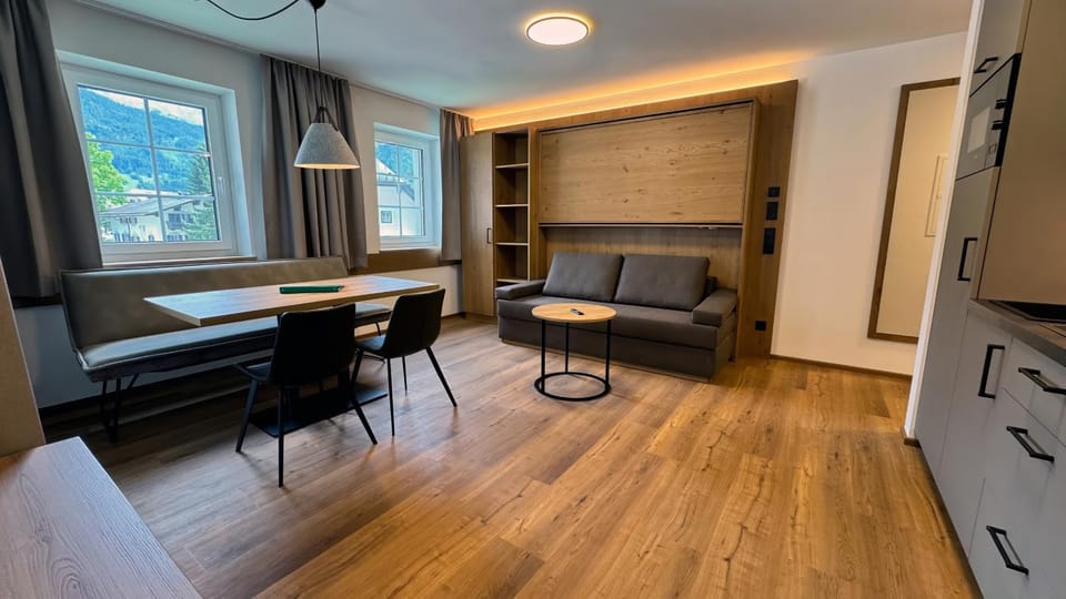 Kitchen or kitchenette, Living room, Seating area, Dining area