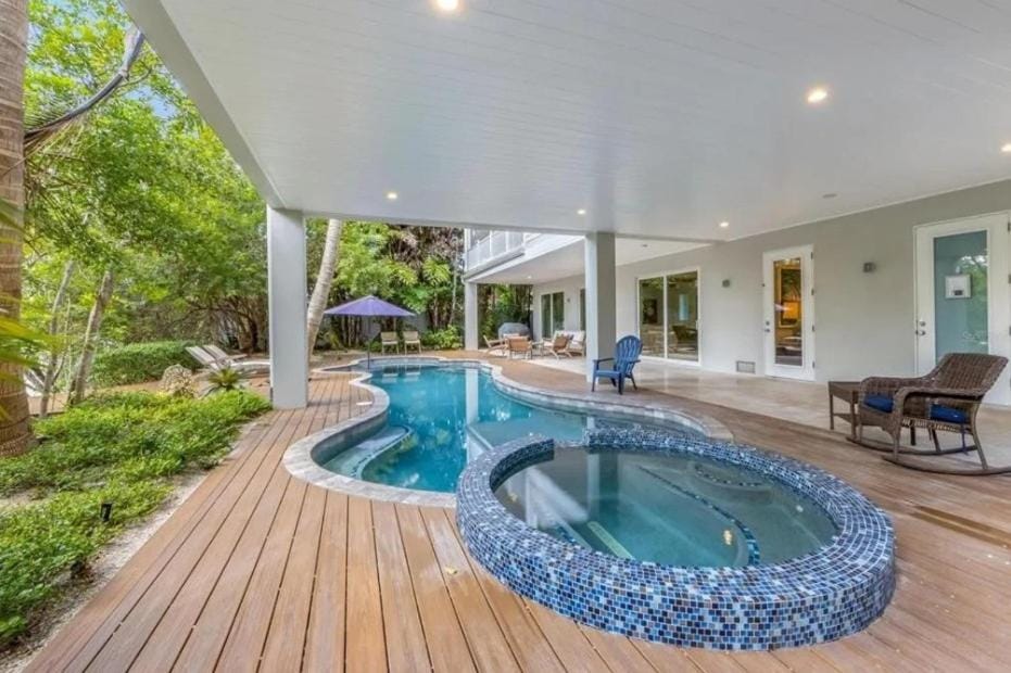 A Shore Thing: On Canal! Pool Spa! Rooftop Deck by Anna Maria Life Vacation Rentals House in Anna Maria Island