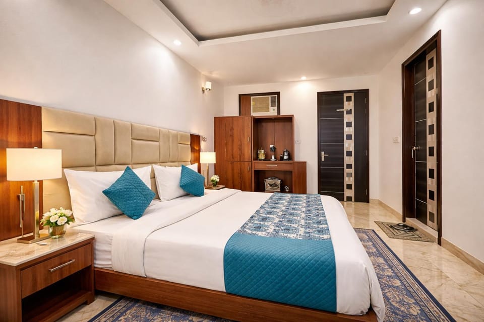 Bed, TV and multimedia, Living room, Seating area, Bedroom, hair dresser, wardrobe