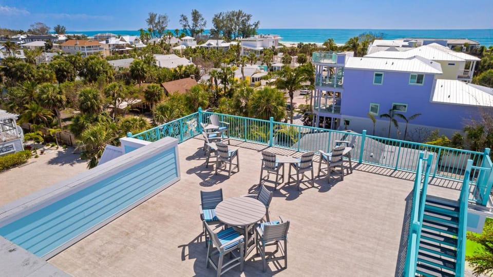 Coral Reef - 50ft to Beach, Games Galore, Rooftop Deck, Pool, Spa by Anna Maria Life Vacation Rentals House in Anna Maria Island