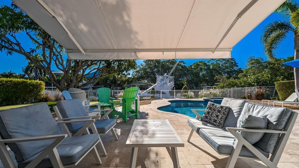Dock Holiday - On Canal, Pool & Spa by Anna Maria Life Vacation Rentals House in Holmes Beach