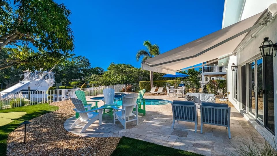 Dock Holiday - On Canal, Pool & Spa by Anna Maria Life Vacation Rentals House in Holmes Beach