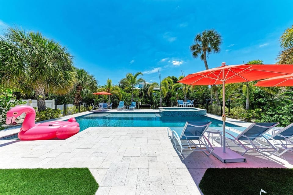 Fancy Flamingo - Canal Front, Dock, Heated Pool & Spa by Anna Maria Life Vacation Rentals House in Anna Maria Island