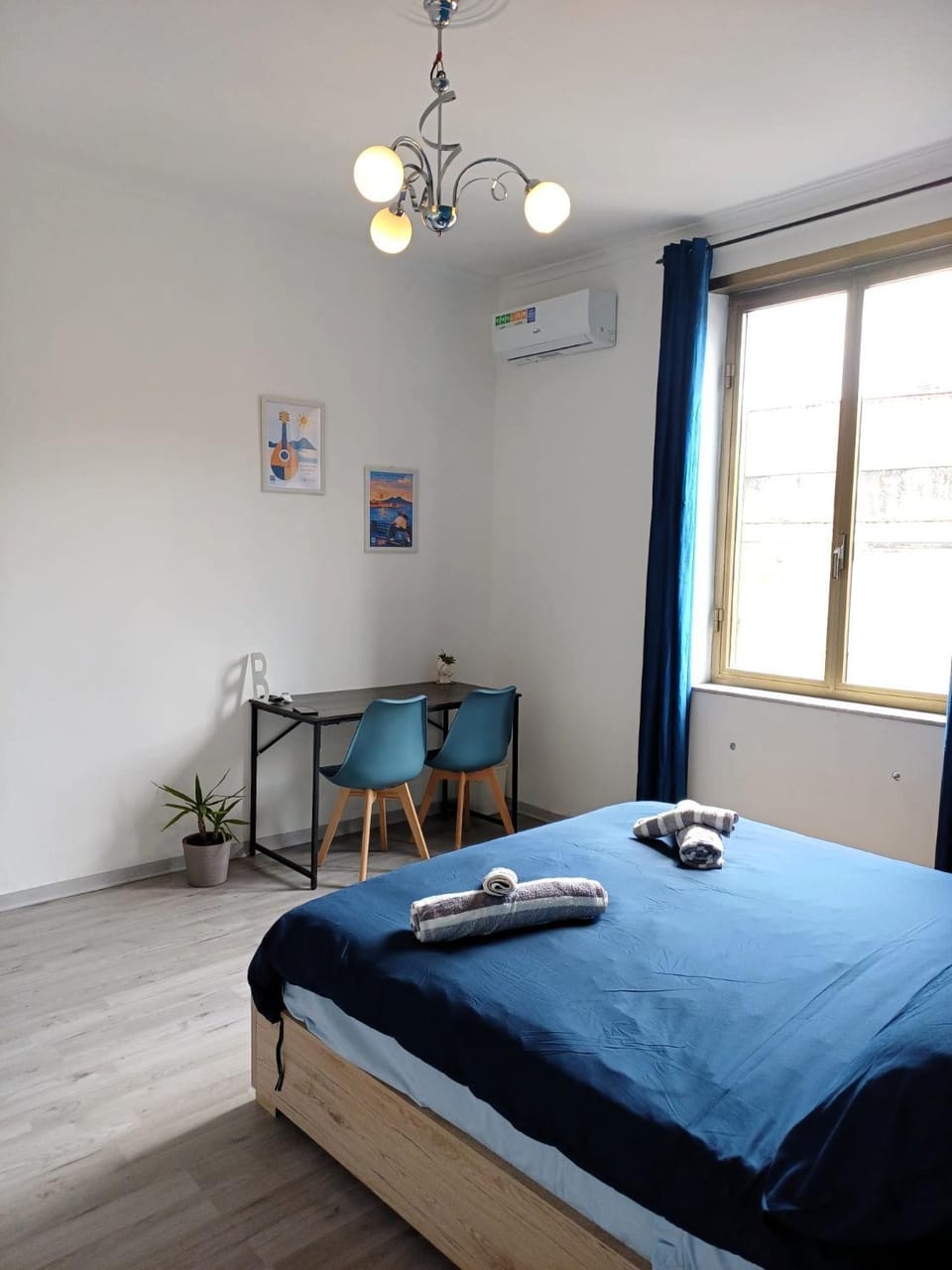 Bed, Photo of the whole room, Bedroom, towels, air conditioner