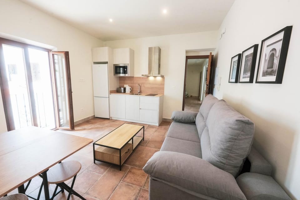Kitchen or kitchenette, Living room, Seating area, Dining area