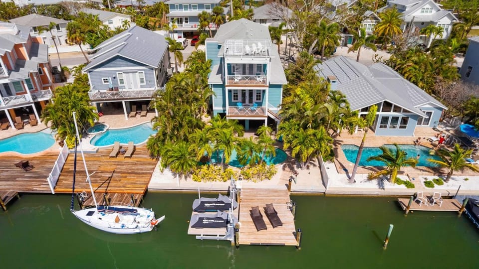 My Grand Floridian - Canal Front, Dock, Pool, Games by Anna Maria Life Vacation Rentals House in Holmes Beach