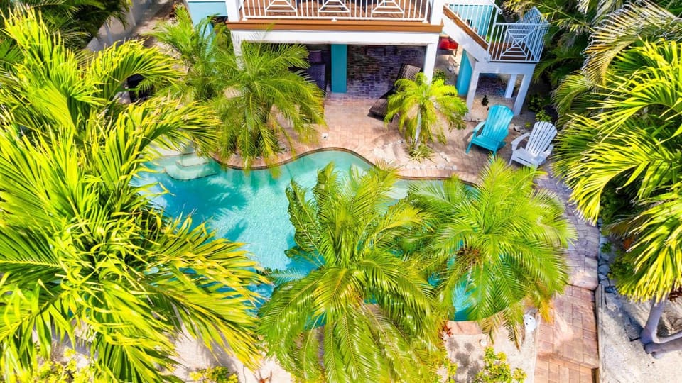 My Grand Floridian - Canal Front, Dock, Pool, Games by Anna Maria Life Vacation Rentals House in Holmes Beach