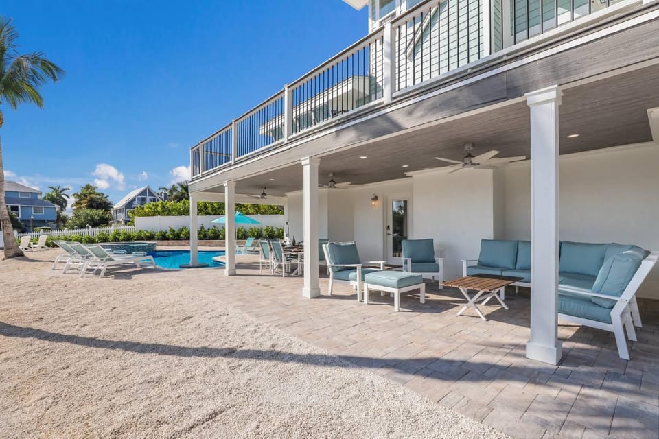 Playing Hooky - On Canal, Dock, Pool & Spa, Game Room by Anna Maria Life Vacation Rentals House in Anna Maria Island