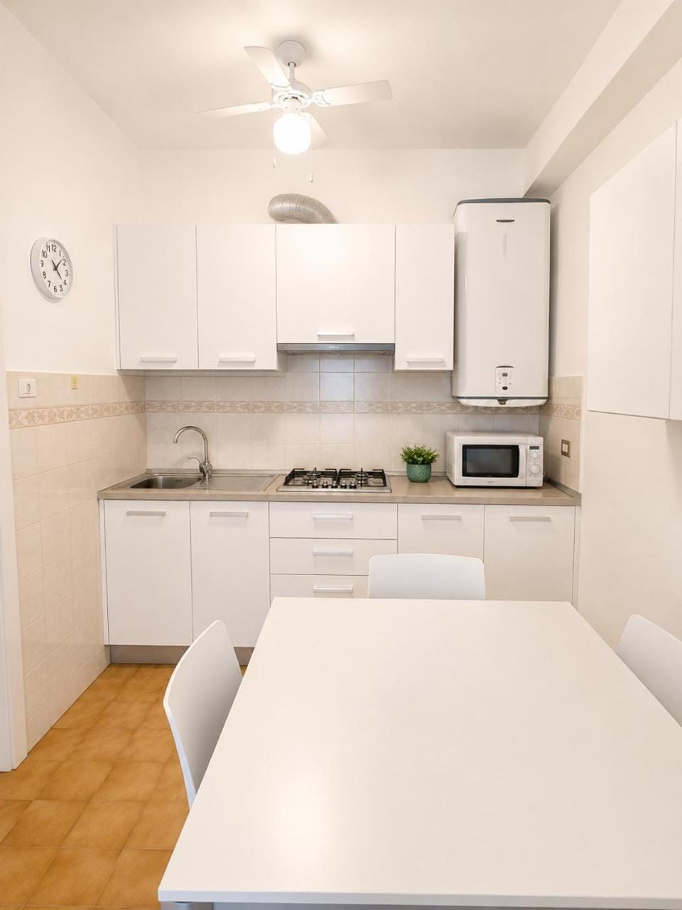 Kitchen or kitchenette, microwave