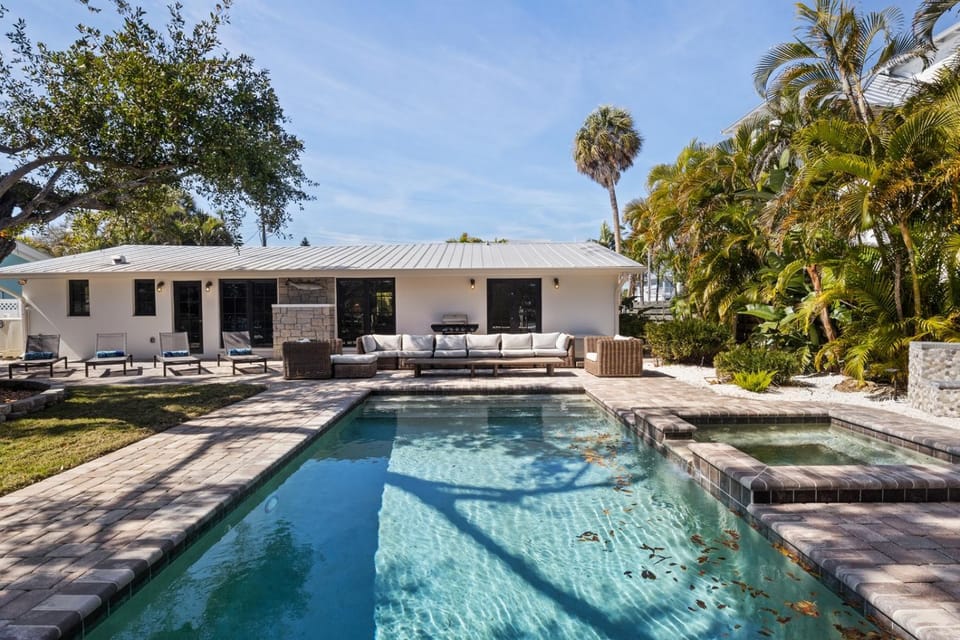 The Fish House - Canal Front, Dock, Pool Spa by Anna Maria Life Vacation Rentals House in Holmes Beach