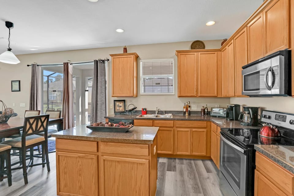 Kitchen or kitchenette, dishwasher, oven, stove, toaster, kitchen