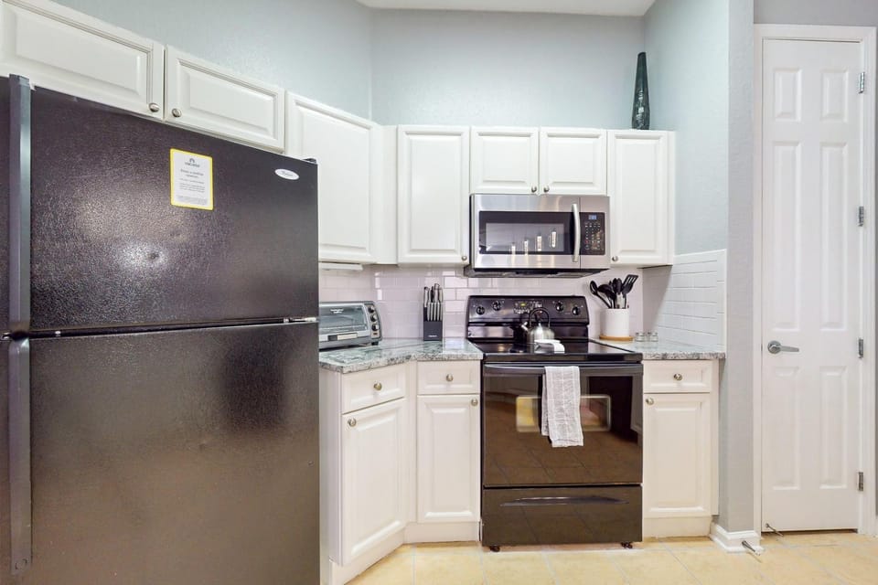 Kitchen or kitchenette, oven, toaster