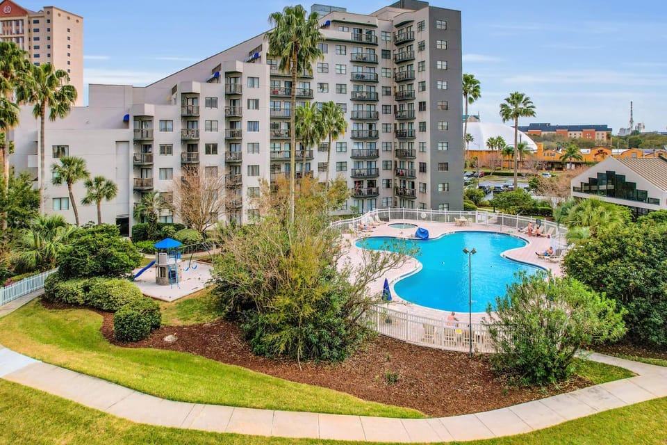Property building, Day, Natural landscape, Pool view, Swimming pool, Swimming pool, sunbed
