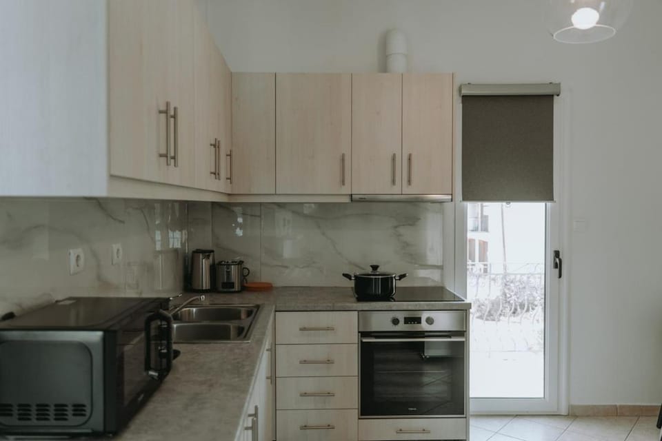 Teal Seafront Home Apartment in Peloponnese, Western Greece and the Ionian