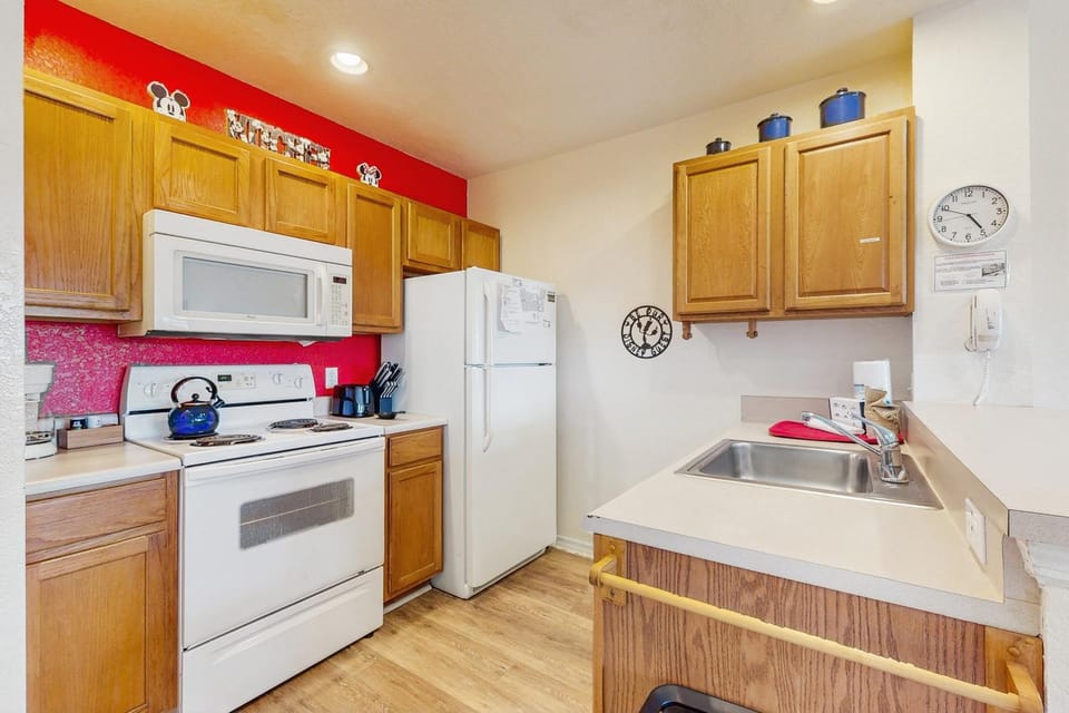 Kitchen or kitchenette, dishwasher, oven, stove, toaster