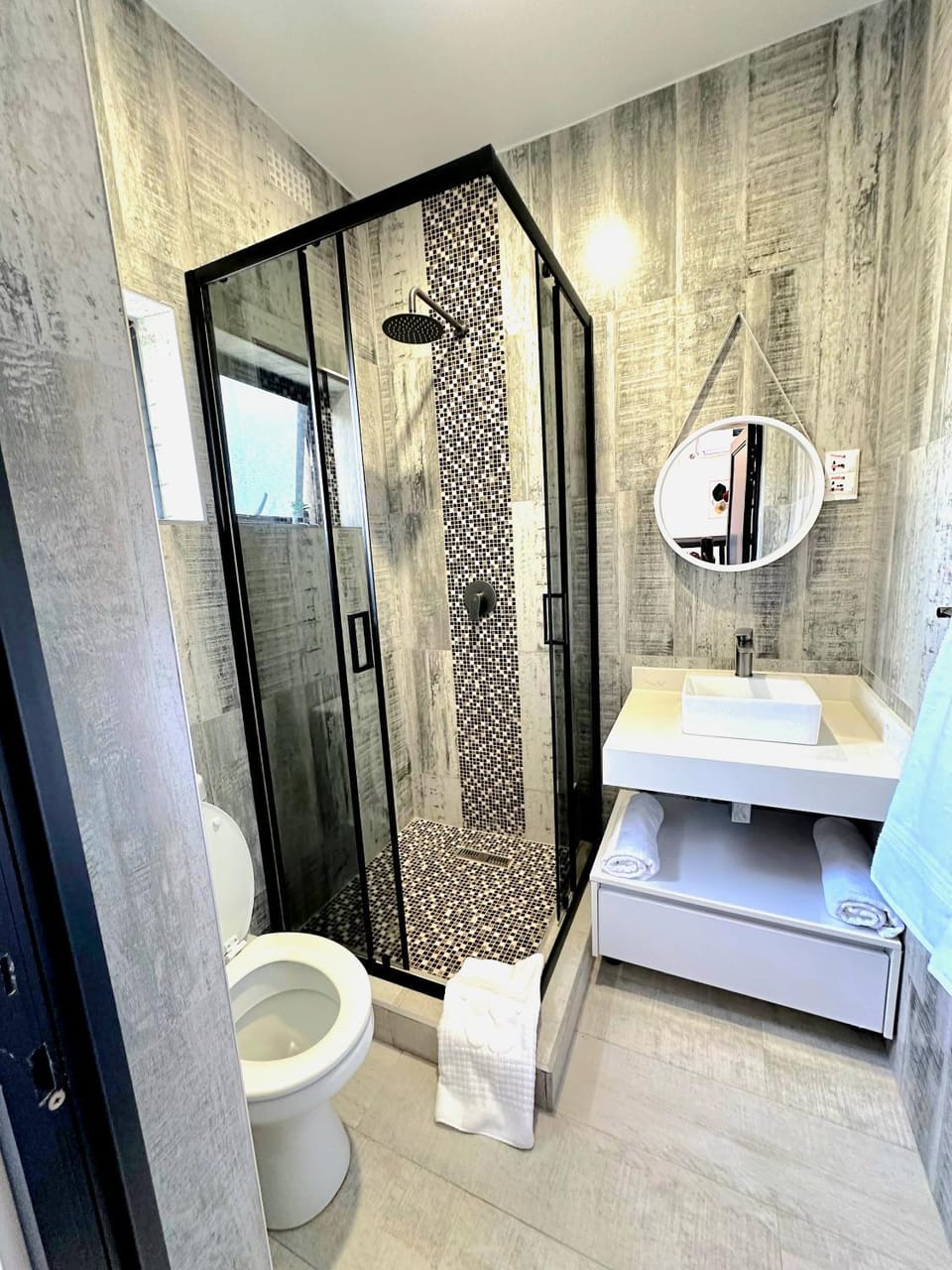 Shower, Toilet, Bathroom, hair dryier, towels