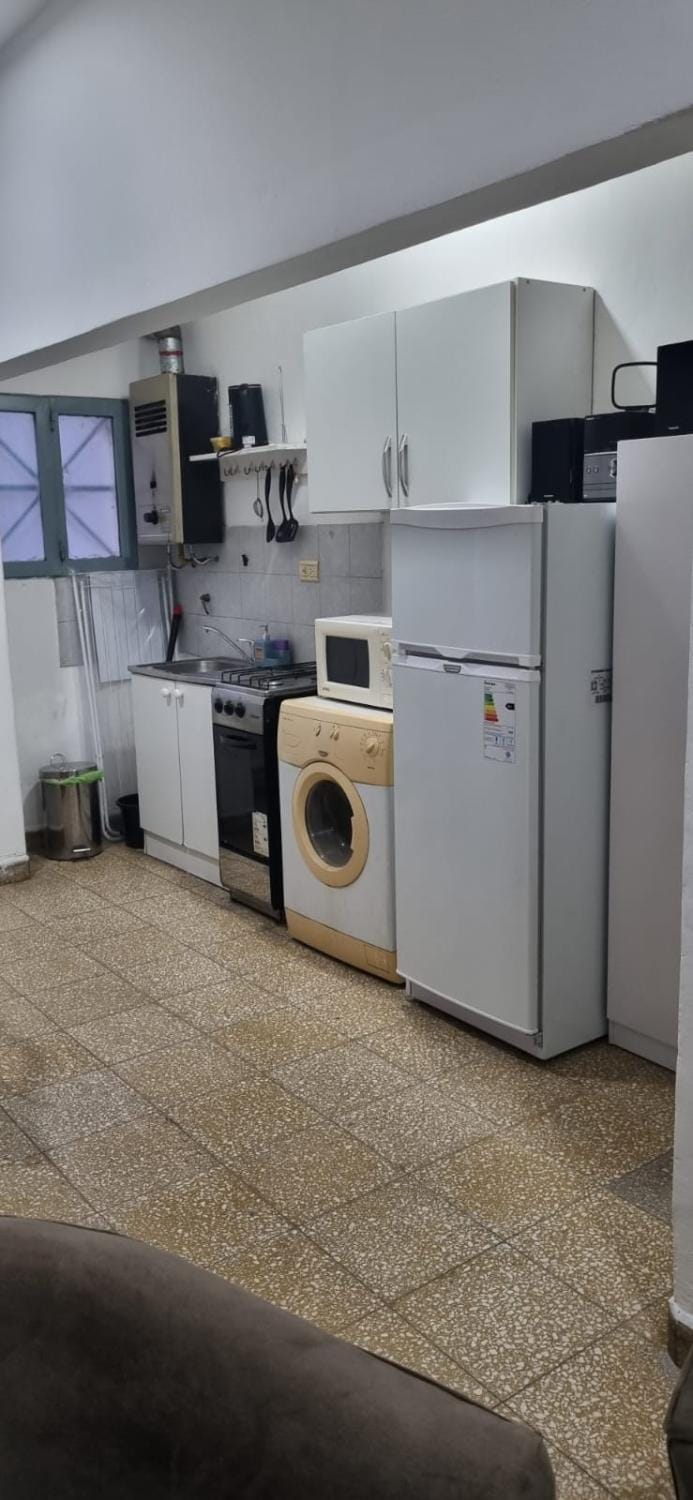 Kitchen or kitchenette, oven, washing machine