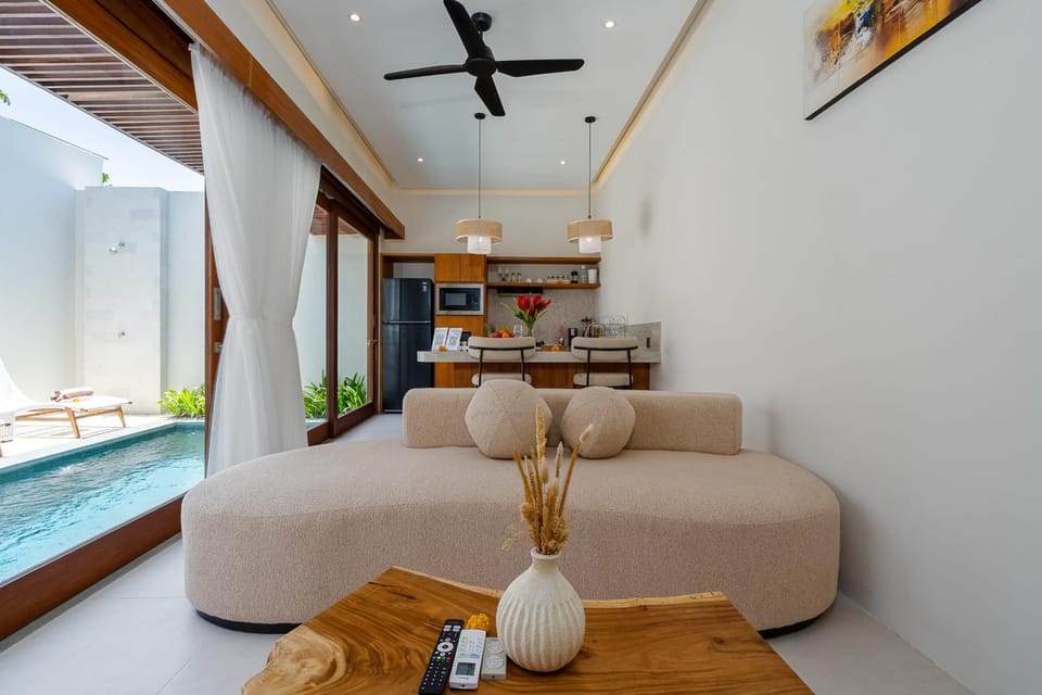 Living room, Seating area, Dining area, Pool view