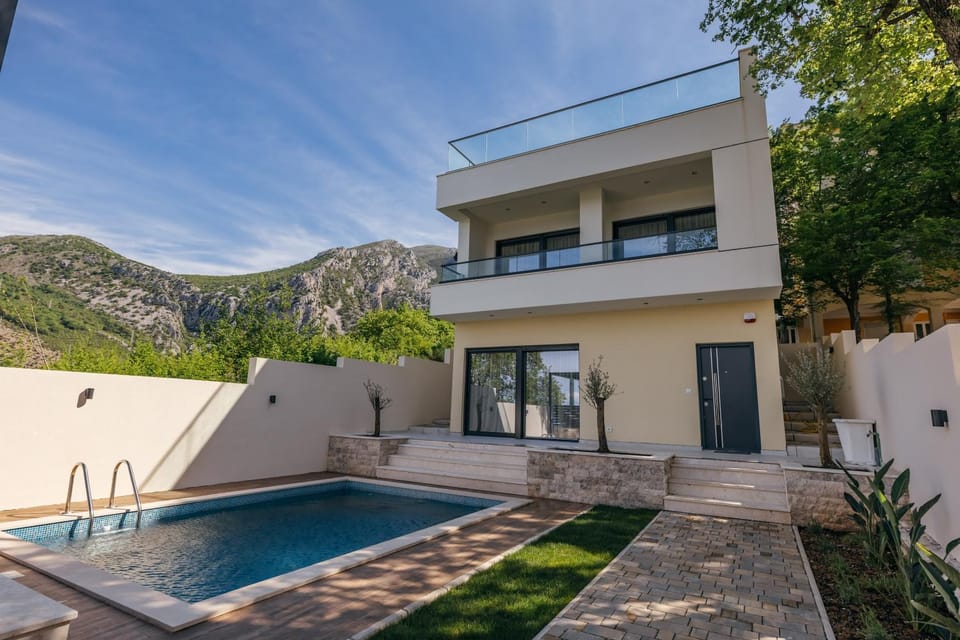 Property building, Patio, Day, Natural landscape, Mountain view, Pool view, Swimming pool