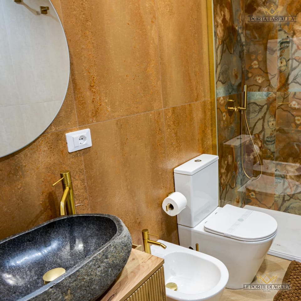 Appartamento piano terra spazio esterno bio climatico Parcheggio libero CATANIA Apartment in Catania