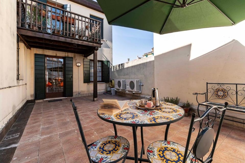 Domus with two terraces and canal view in Dorsoduro Apartment in Venice