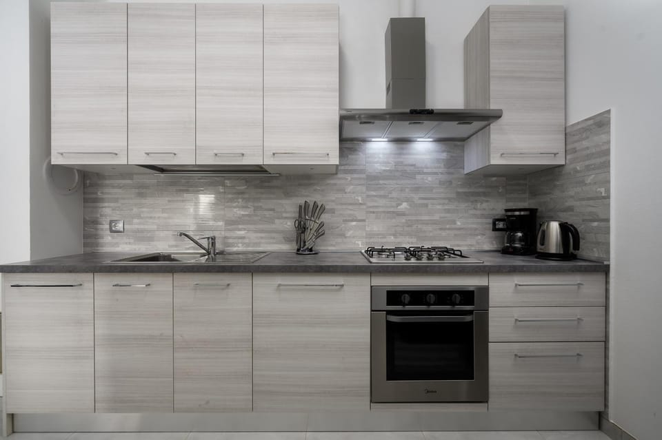 Kitchen or kitchenette, stove