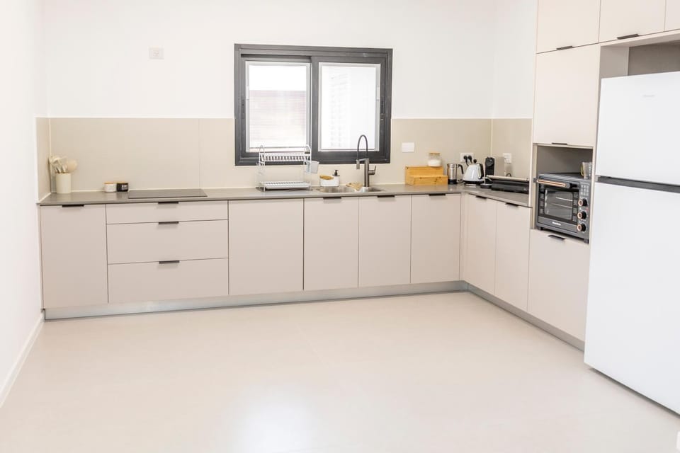 Kitchen or kitchenette, stove, toaster