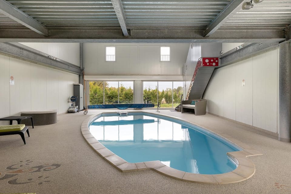 Property building, Living room, Swimming pool