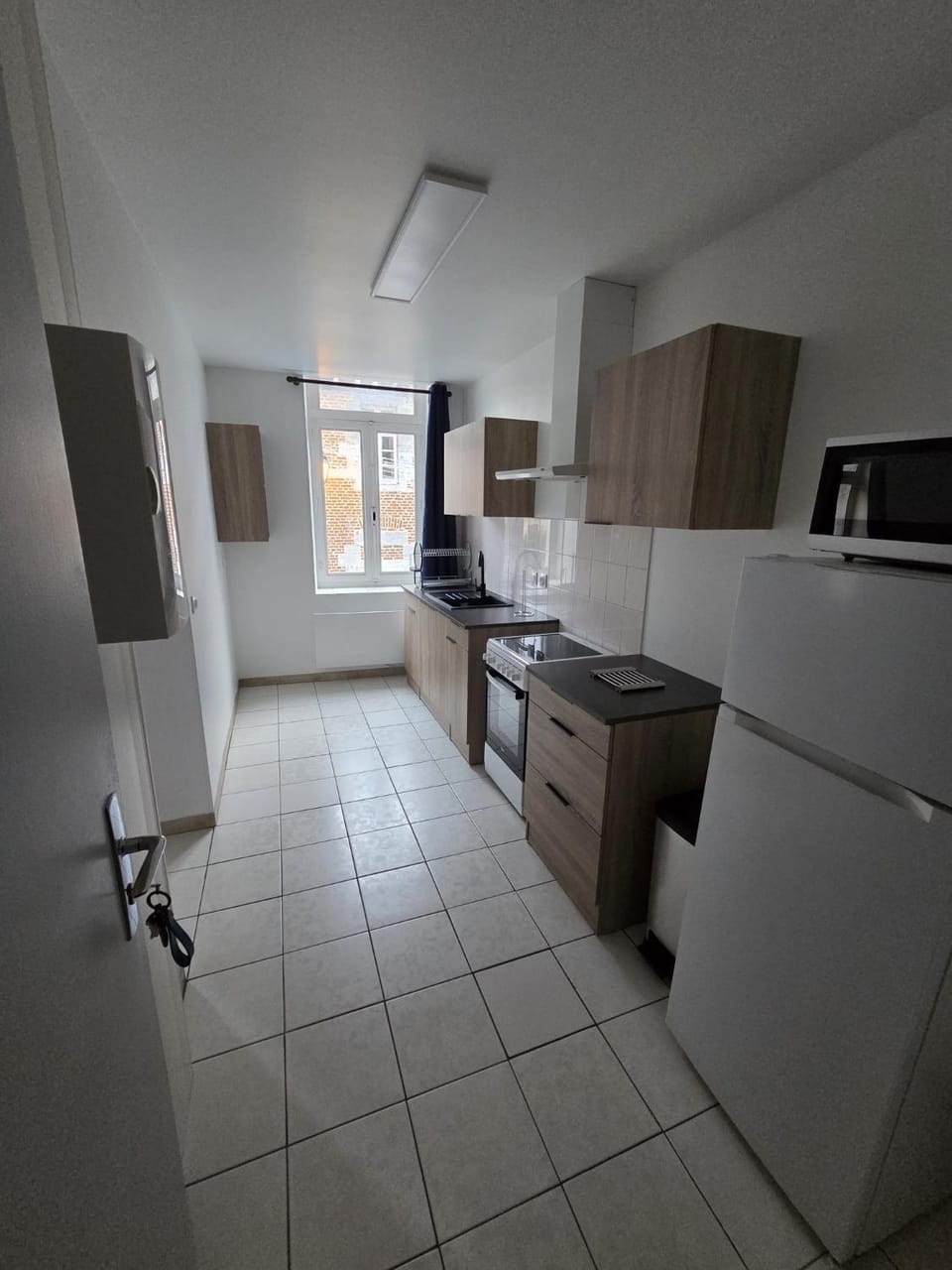 Kitchen or kitchenette, oven, stove
