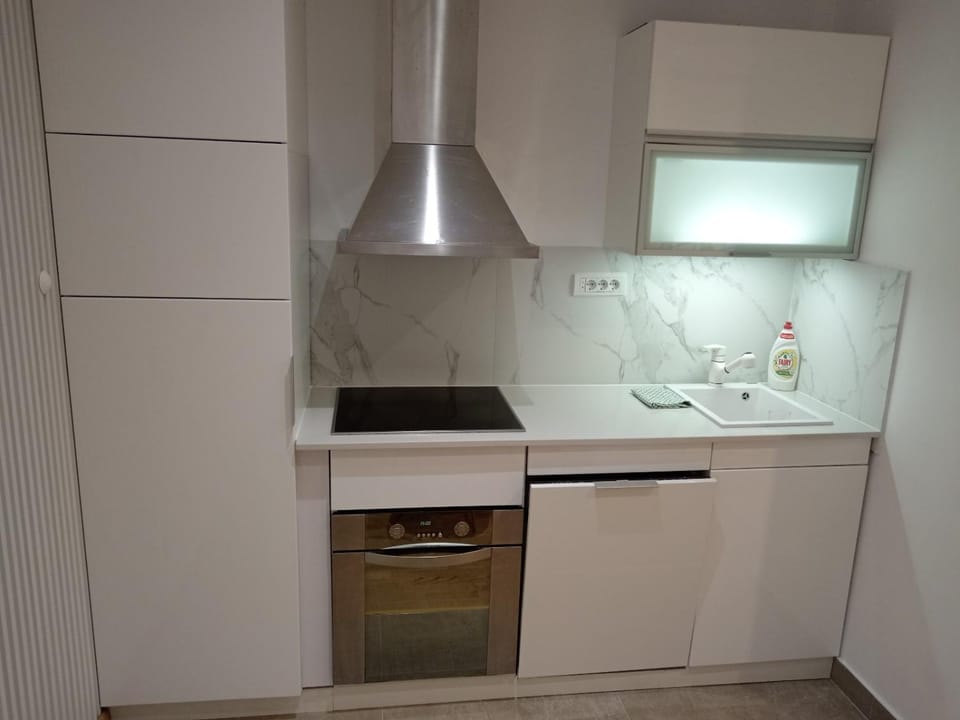 Kitchen or kitchenette, stove