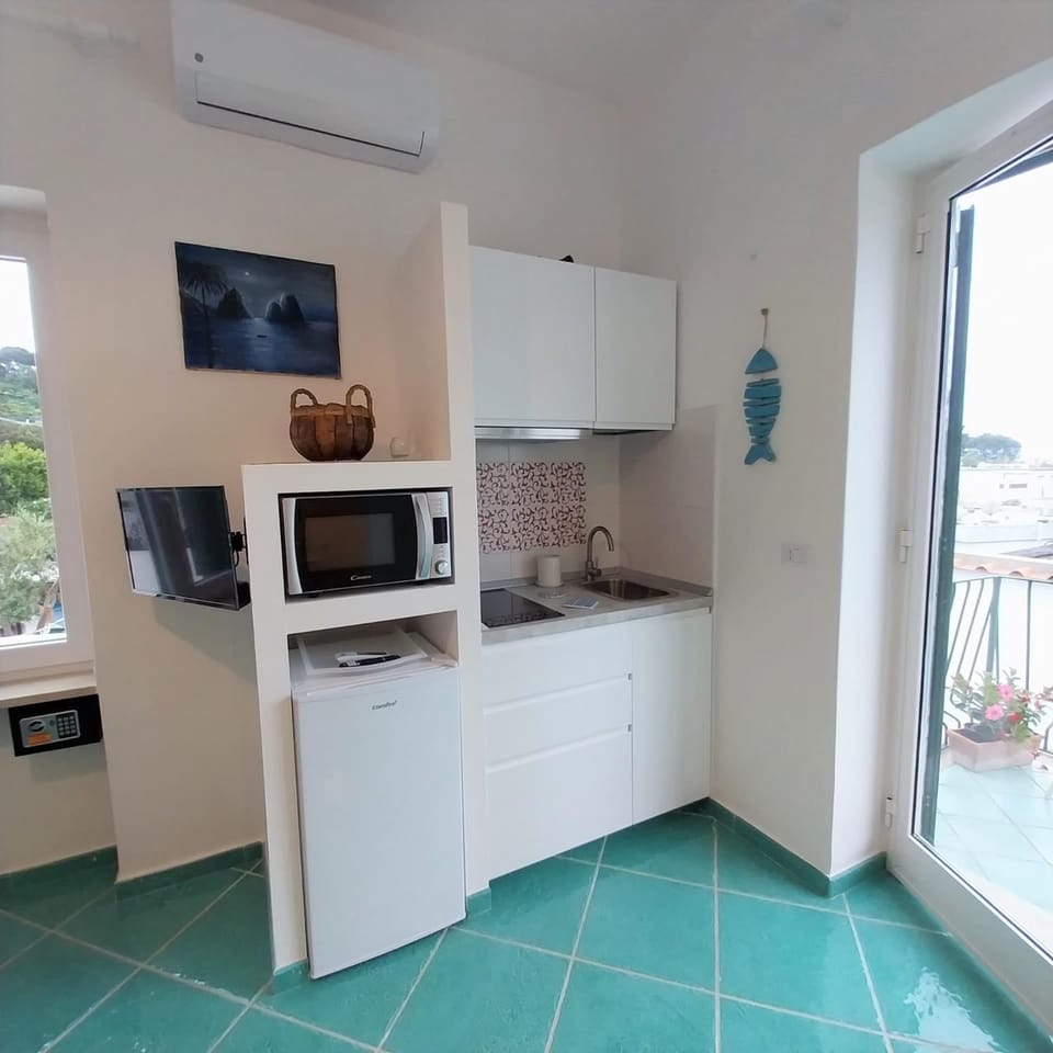 Kitchen or kitchenette, stove