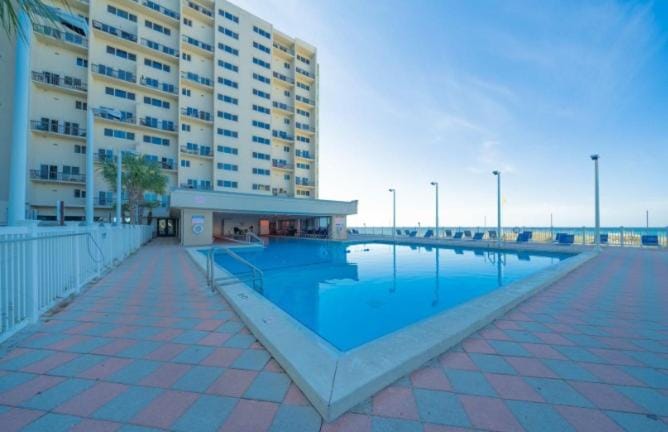 Property building, Pool view, Swimming pool, sunbed
