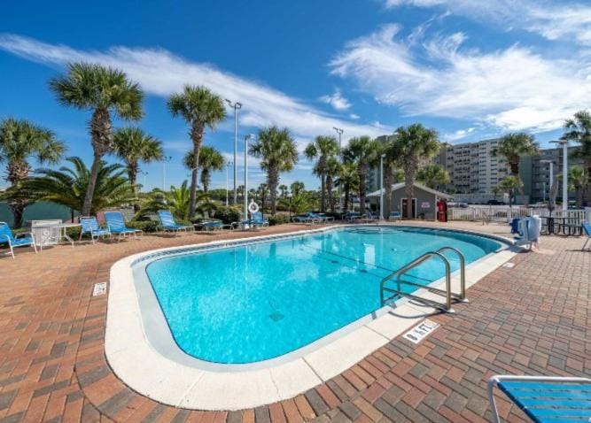 Property building, Pool view, Swimming pool, sunbed