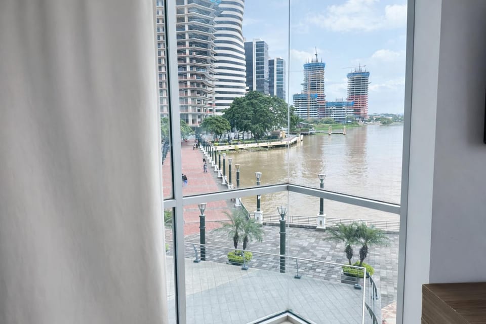 Property building, Nearby landmark, Day, Natural landscape, View (from property/room), City view, River view