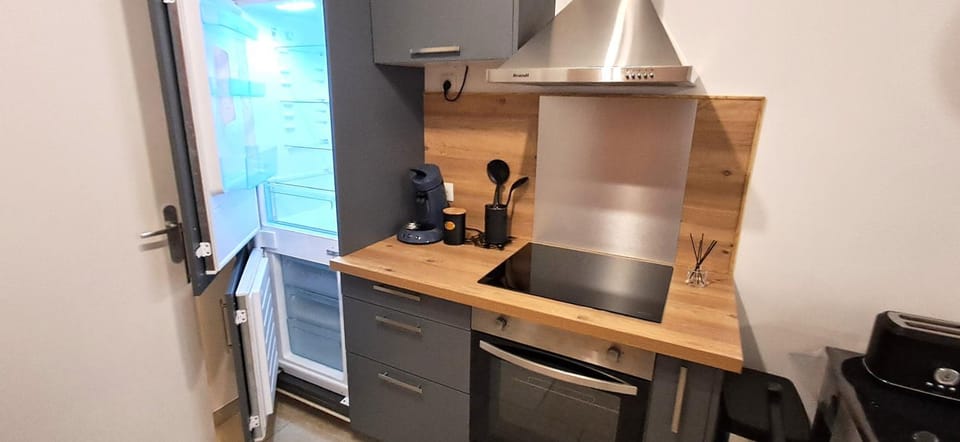 Kitchen or kitchenette, stove