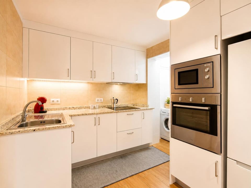 Kitchen or kitchenette, oven, stove