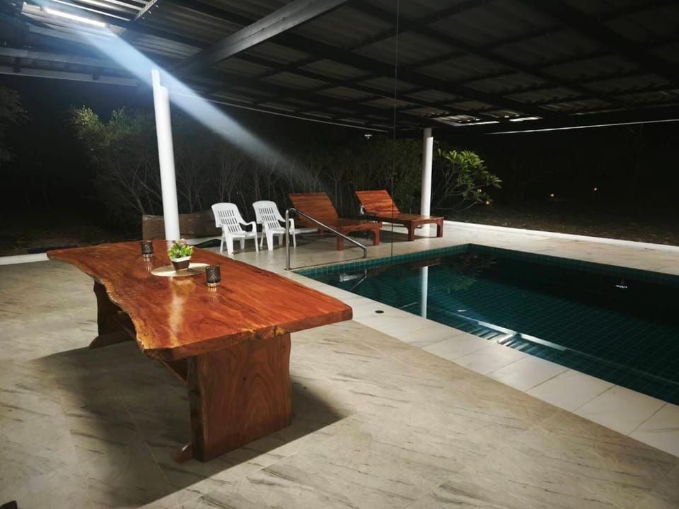 Swimming pool, sunbed