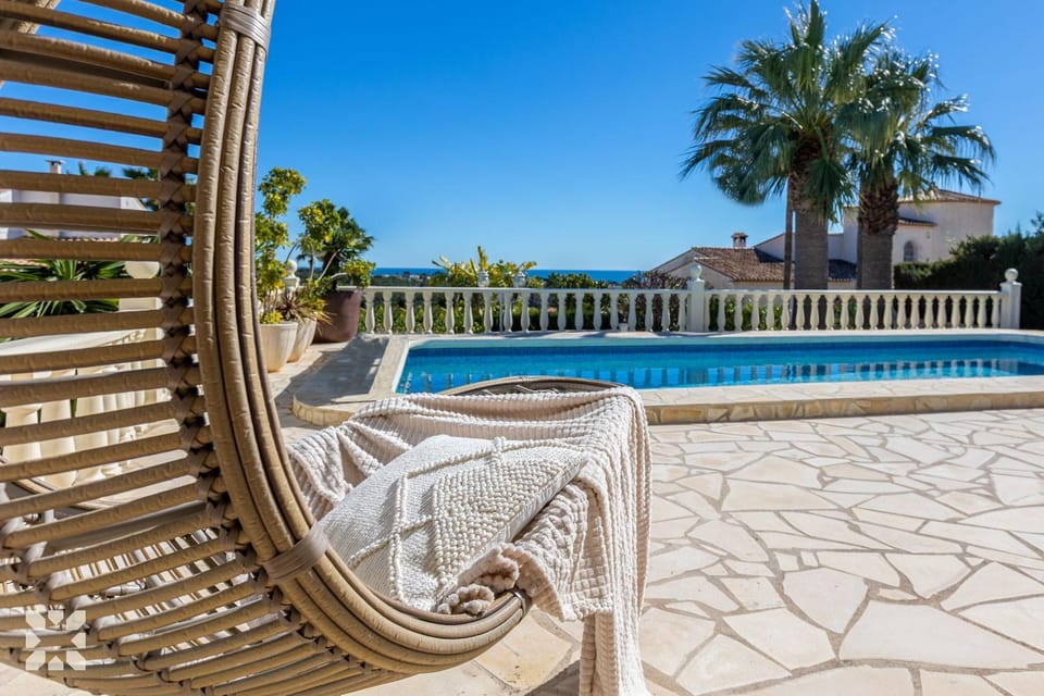 Patio, Day, Natural landscape, Pool view, Swimming pool, sunbed