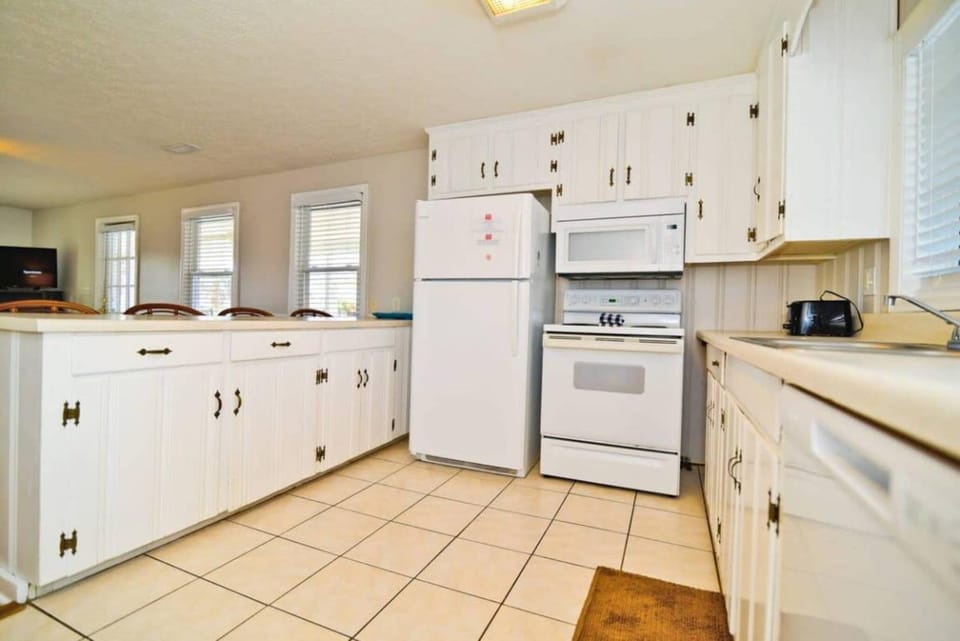 Kitchen or kitchenette, oven, stove, toaster